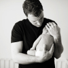newborn-baby-girl-with-daddy-arms